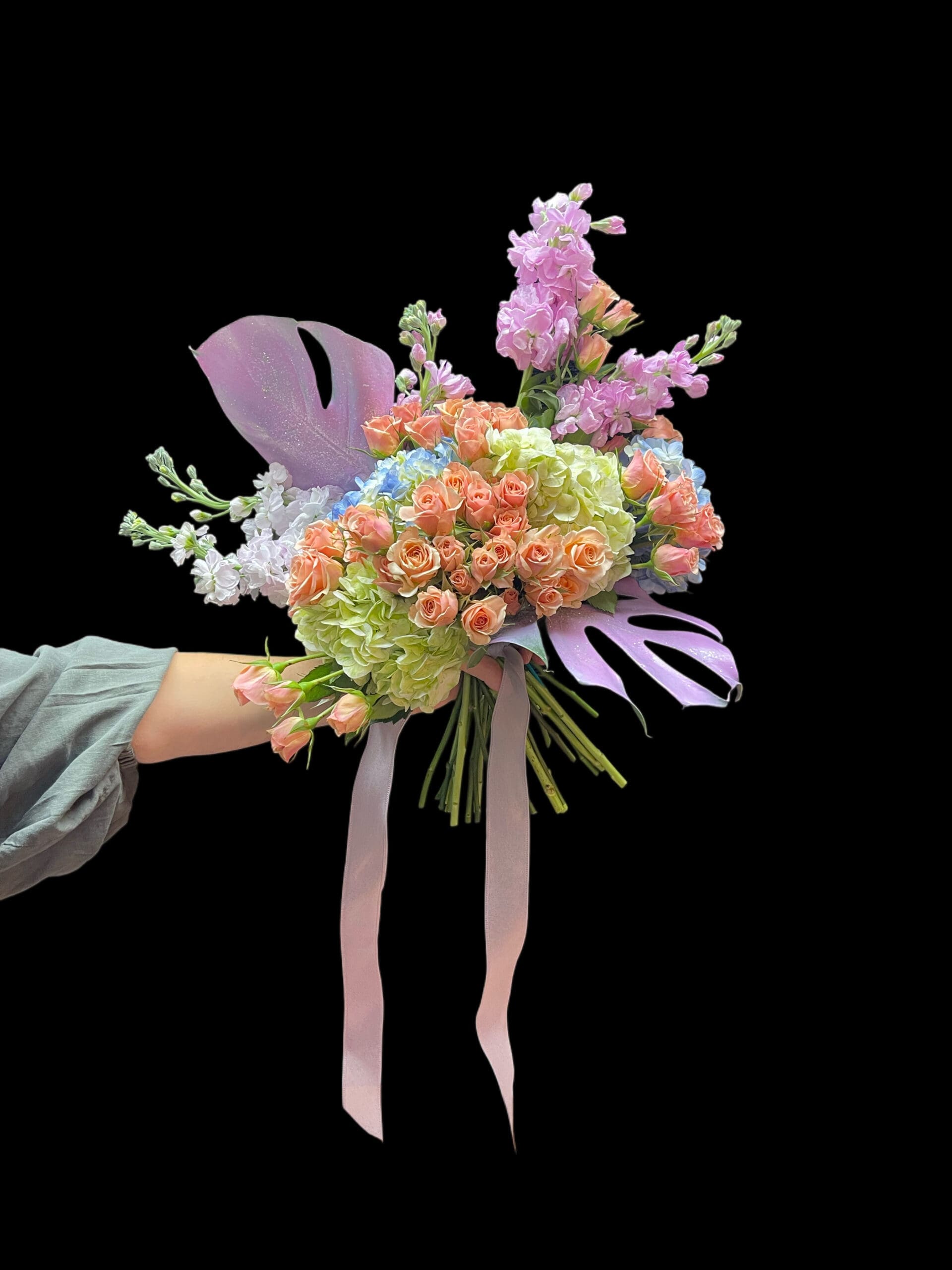 Hand-tied bouquet in peach and lavender with silk ribbon, Naples Picasso Flowers, Naples FL