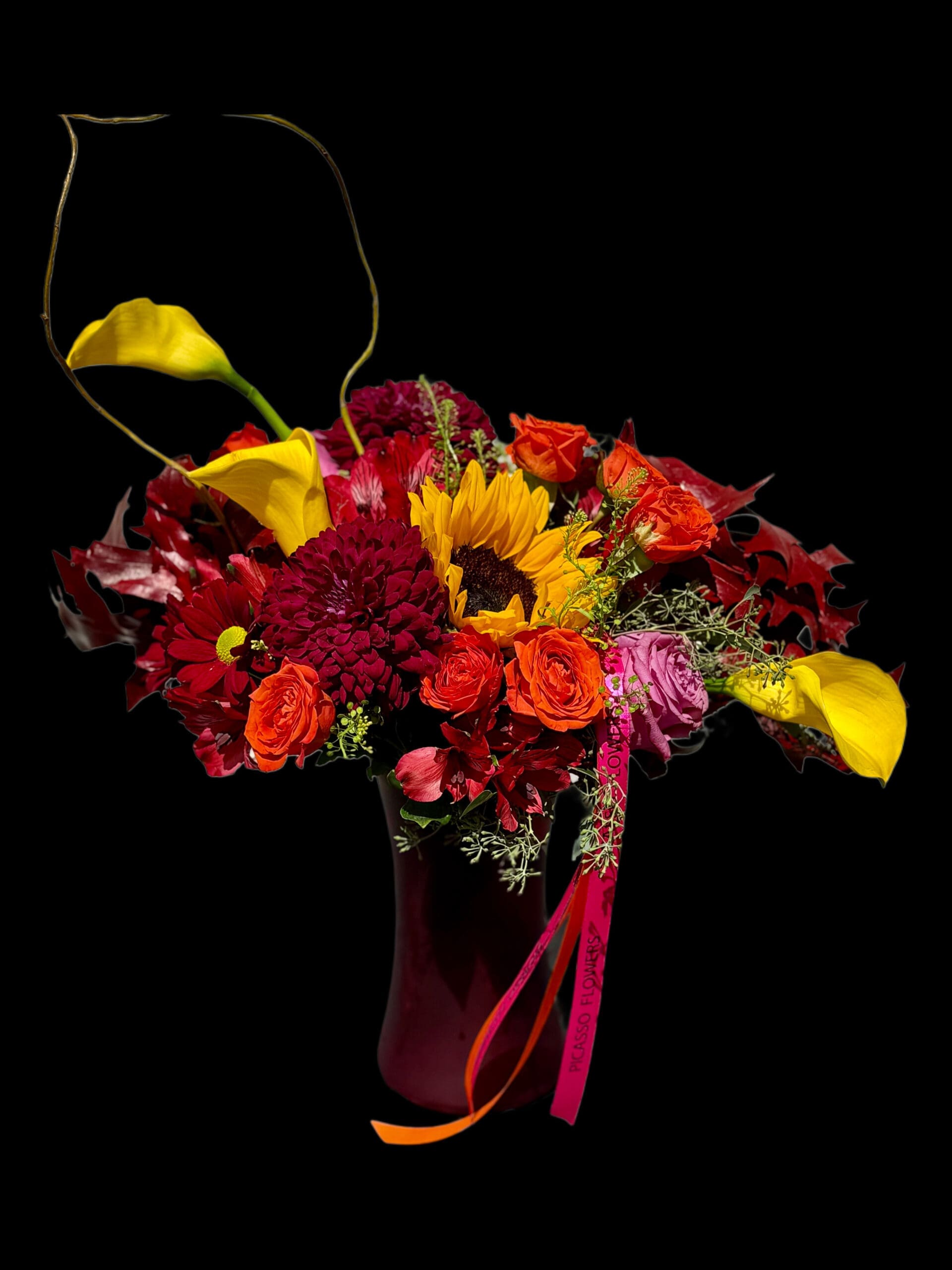 Tall fall arrangement in crimson and deep gold in a red vase, fall flowers in Naples by Naples Picasso Flowers